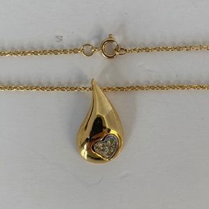 Z31- Costume jewelry- Gold colored necklace with a drop like pendent.